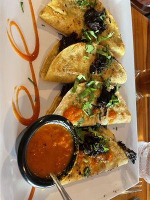 Hibiscus tacos with vegan cheesee  at De La Vega in Deland