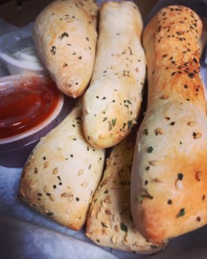 Breadsticks 🔥 Best in town ➕Vegan 🌱 at Rockit's Famous Pizza in Bloomington