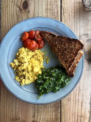 Surf, tofu scramble and homemade bread. Life doesn’t get better than this.   at Hang Ten Cafe in Muizenberg
