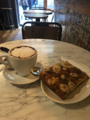 Cappuccino and focaccia   at The Vegan Corner in Barcelona