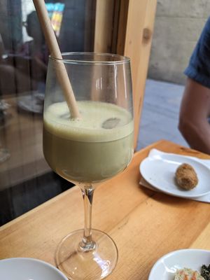 Half drank matcha latte  at The Vegan Corner in Barcelona