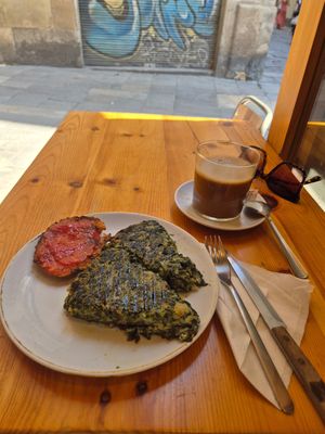 Spinach frittata and flat white at The Vegan Corner in Barcelona