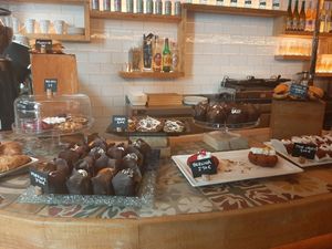 Assortment of baked goods, sandwiches with omelettes or frittatas and some pasta options with vegetables at The Vegan Corner in Barcelona