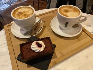 Coffee with something sweet! at The Vegan Corner in Barcelona