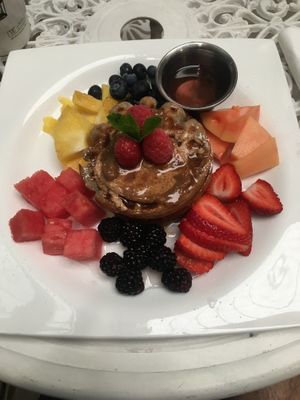 Vegan waffles with pear sauce and fruit   at Juice By J in Grand Rapids