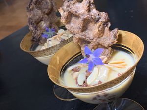 Vegan Vanilla Custard:  Mung Bean Cocoa Nibs Waffle, Almonds, Coconut, Borage Flower at Juice By J in Grand Rapids