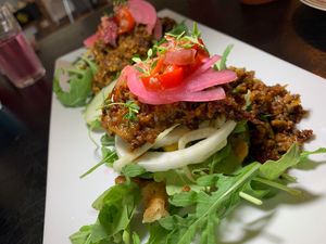 Vegan "Burger": Jackfruit, Lentils, Garbanzo, Watercress, Beet, Summer Squash, Pickled Onions, Golden Beets, Arugula on a Sweet Potato Waffle at Juice By J in Grand Rapids