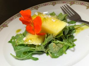 Yellow Watermelon Salad w/ Arugula, Cashew Cheeze, Basil Pesto Dressing at Juice By J in Grand Rapids