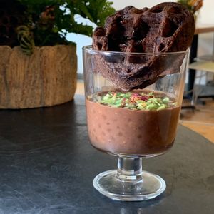 Porridge: Cacao-Marshmallow Sweet Potato Waffle, Dark Cacao Coconut Nibs, Pandan Rice Crispies, Moroccan Rose Sprinkles at Juice By J in Grand Rapids