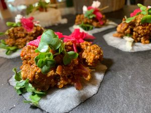 Tacos: Garbanzo Beans, Golden Beets, Kale, Watercress served on Radish w/ side of 
Coconut Sweet Rice, Sambal, Micro Greens, Vegan Feta at Juice By J in Grand Rapids