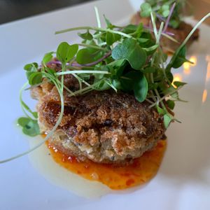 Croquette (Sweet Potato, Cashew, Beets, Vegan Meat & Cheeze), Micro Greens, Chili Sauce, Avocado Oil at Juice By J in Grand Rapids