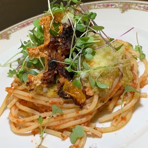 Quinoa & Brown Rice Spaghetti in Tomato, Garlic & Parsley Sauce, Micro Greens, Vegan Cheeze, Waffle Crisp
 at Juice By J in Grand Rapids