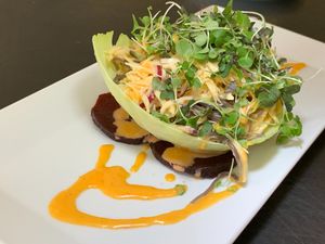 Beet Gazpacho: Sweet Potato & Cabbage Noodle, Micro Greens, Turmeric Golden Beet Sauce at Juice By J in Grand Rapids