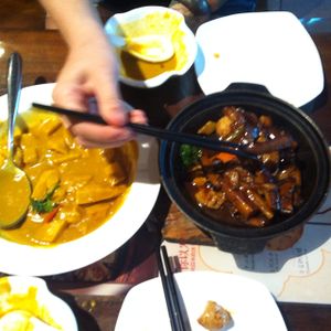 Digging in to an eggplant + mushroom and tofu in soy sauce and a Seitan-potato curry at Yi Xin Vegetarian - Tianhe District in Guangzhou