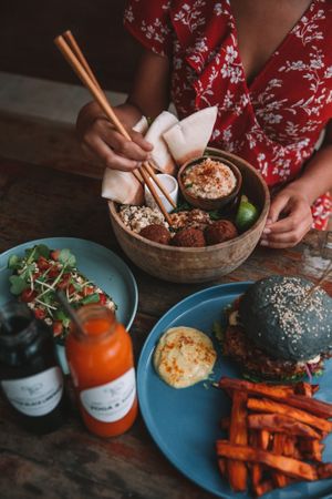 Falafel salad bowl, vegan burger at Roots in Hanoi