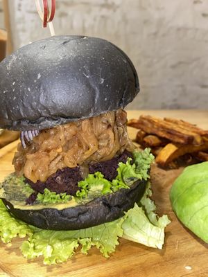 Black bean patty with caramelized onions  at Roots in Hanoi