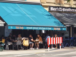 Front and outdoor seating at Nish Nush in Cologne