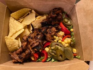 “Street corn” salad with pulled pork. Delivery via Wolt  at Las Vegan's - Kazinczy 11 in Budapest