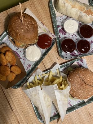 Burgers and burrito, Order less Sauce if you are not into kilos of Sauce, so it doesn‘t get Wasted  at Las Vegan's - Kazinczy 11 in Budapest