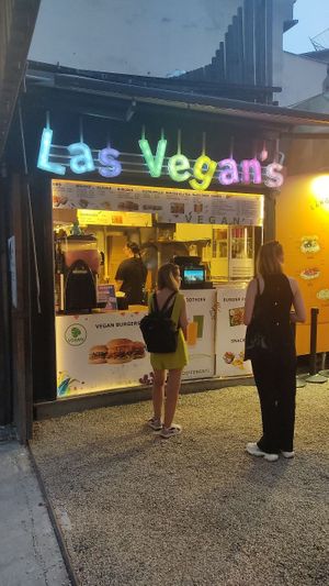 can confirm that Las Vegans is alive, open and at the same place that it is listed here on Happy Cow! didn't try their food this time but looks yummy at Las Vegan's - Kazinczy 11 in Budapest