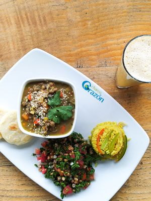 Lentil soup with rice, salad and arepa at Lulo's Restaurante in Jardin
