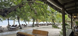 Seating places indoor and at the beach at Long Beach Resort in Koh Rong