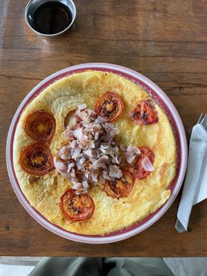 Tomato and caramelized onion pancake   at Pancake 4 Paws in Ratnanagar