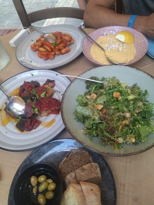 Giant beans, fava, eggplant and Lolita salad without cheese at Aiolos Taverna in Nafplion