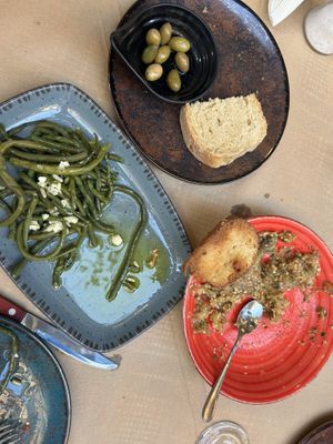 Green beans with garlic, bread and olives, eggplant spread  at Aiolos Taverna in Nafplion