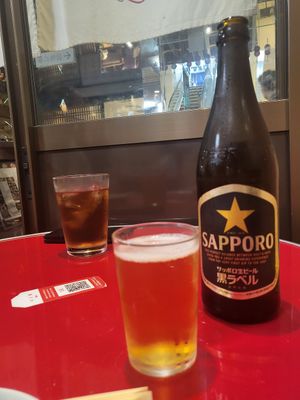 Sapporo beer and ice tea high ball at Izakaya Masaka in Tokyo