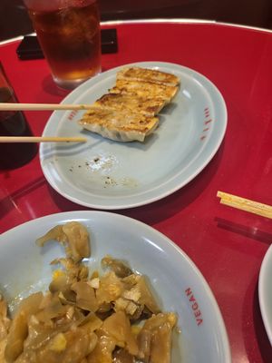 Szechuan pickles in chili oil and 6 dumplings at Izakaya Masaka in Tokyo