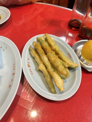 Tempura green beans sprinkled with curry powder   at Izakaya Masaka in Tokyo