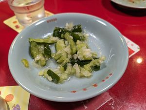 Cucumber Salat with onions and spring onions at Izakaya Masaka in Tokyo