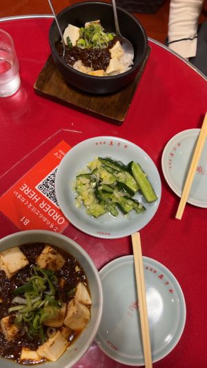 Cucumbers and mapo tofu  at Izakaya Masaka in Tokyo