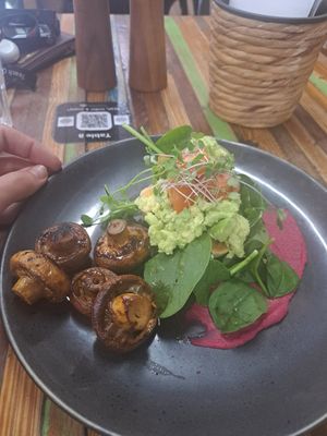 Tiny piece of bread. Paid extra for the mushrooms ontop of $17.90 just for the avo on toast at The Junction Cafe in Tannum Sands