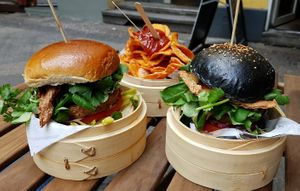 BBQ Burger, Kiiro Black Burger and fried sweet potatoes at Kiiro Burger in Berlin