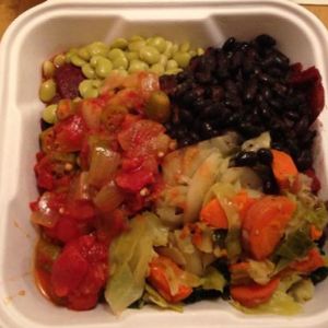 assortment of vegan foods in take-away box  at Rainbow Natural Foods Market & Restaurant in Decatur