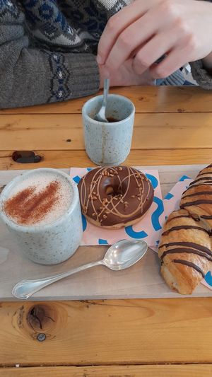 Schoggigipfeli, Hazelnut Donut, Coffee and Chai Latte with oat milk at Bakery Bakery - Breitenrain in Bern