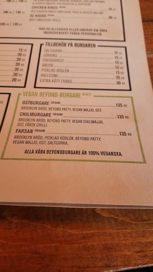 Beyond burgers menu with cheese burger, chili burger and dad burger at Brödernas in Stockholm
