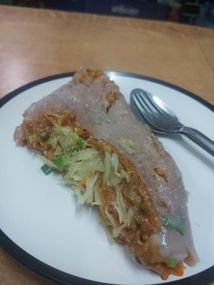 Shan Pizza, rise flour base with tasty peanut sauce and shredded veggies. at Shan Food in Chiang Mai