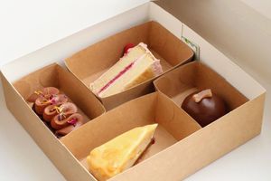 Treat box - chocolate & rose cream slice, jammie dodger cake, chocolate orange bombe, salted caramel cheezecake at Chez Malachy - Preorder only in Brussels