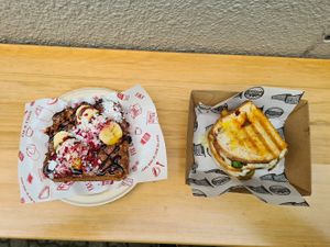 Dark Choc Penautbutter with coconut, banana, chocsauce. Partner had something with pickles and cheese and smoked hot peanutsauce at Fix & Fogg in Wellington