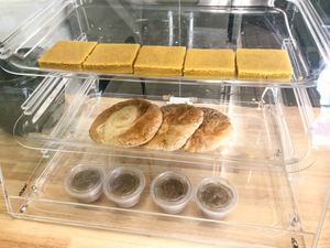 Dessert Case: Turmeric cake, Tahini bread, Spiced bread pudding. at Vegiterranean Kitchen in Moorpark