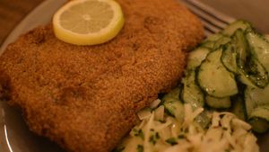 cordon bleu meal with cole slaw and cucumber salad at Försters in Berlin