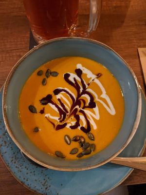 Delicious pumpkin soup but without bread. at Försters in Berlin