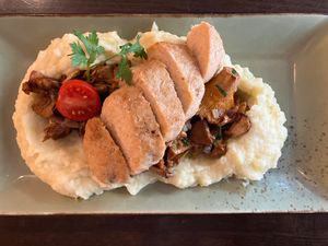 Grilled chicken breast with sautéed chanterelles and truffled mashed potatoes at Försters in Berlin
