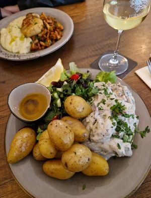 vegan smoked marinated herring with potatoes, vegetables and dill sauce at Försters in Berlin