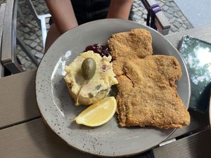 soy schnitzel vienna style w potato salad, cucumber salad, lingon berries  at Försters in Berlin