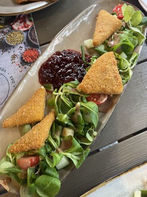 vegan cheese wedges w lingonberries   at Försters in Berlin