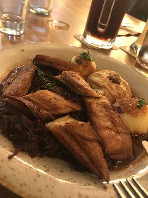 christmasy duck with red cabbage and traditional kale, baked apple and potato balls  at Försters in Berlin